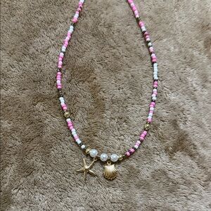 Pink and White Beaded Necklace with Gold Charms